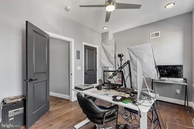 a view of entryway with wooden floor