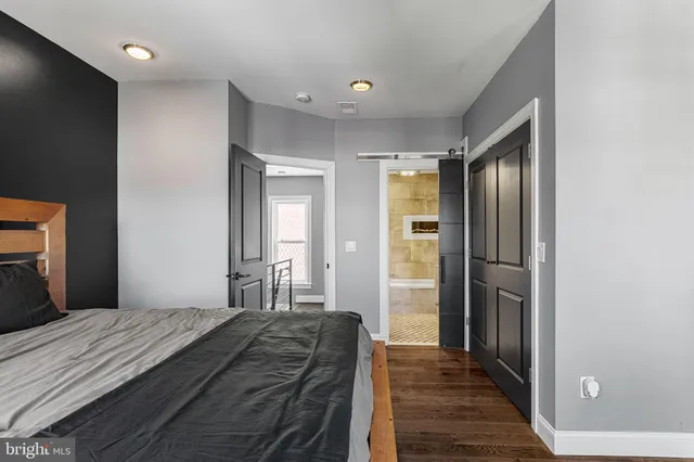 a room with gym equipment and mirror