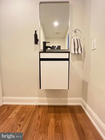 a view of a living room with a wooden floor