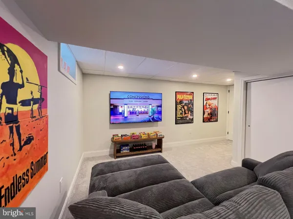 a theatre with furniture and a couch