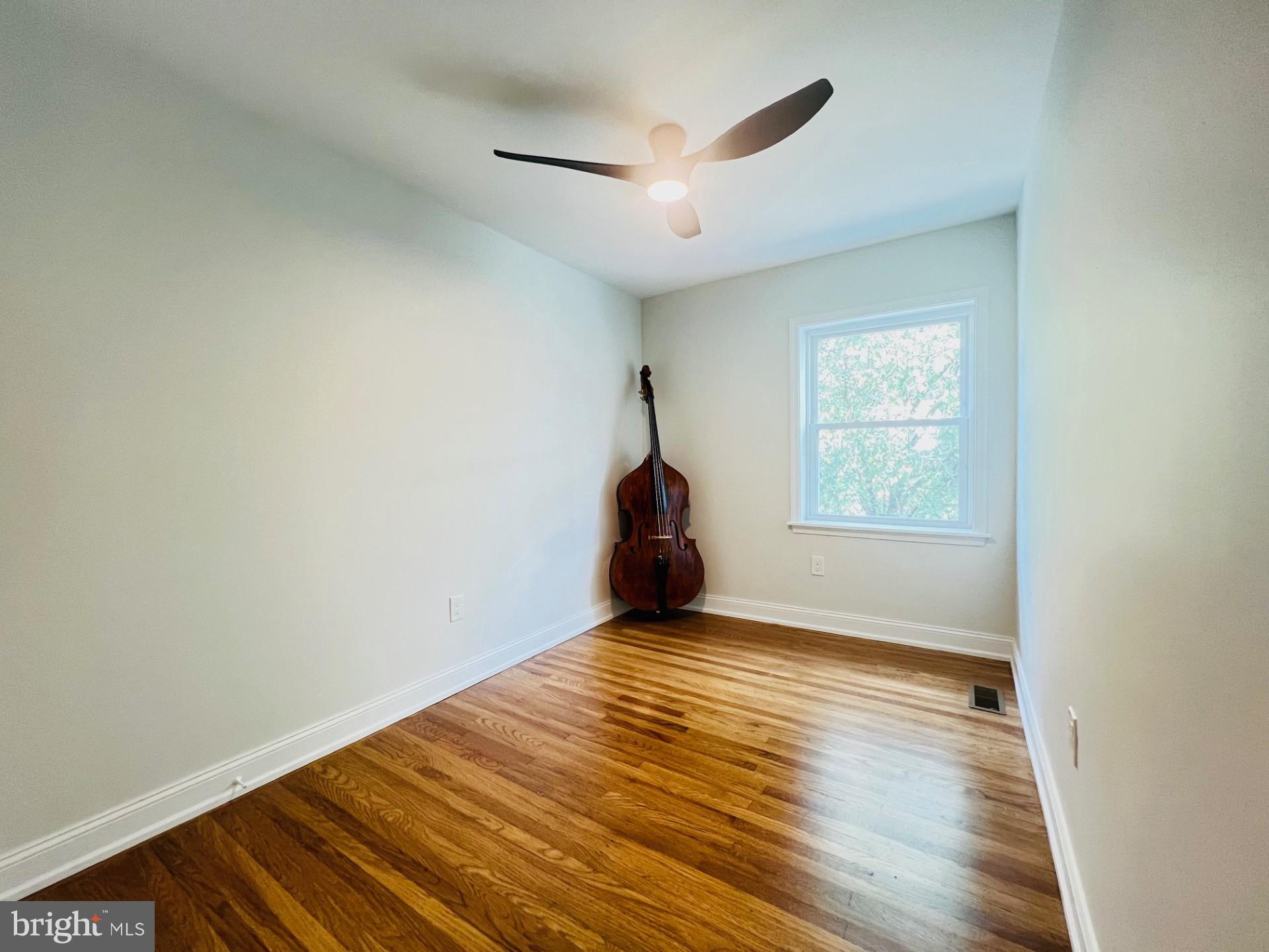 4735 Sheldon Street Philadelphia, PA 19127 - Photo 31 of 40 wooden floor in an empty room with a window