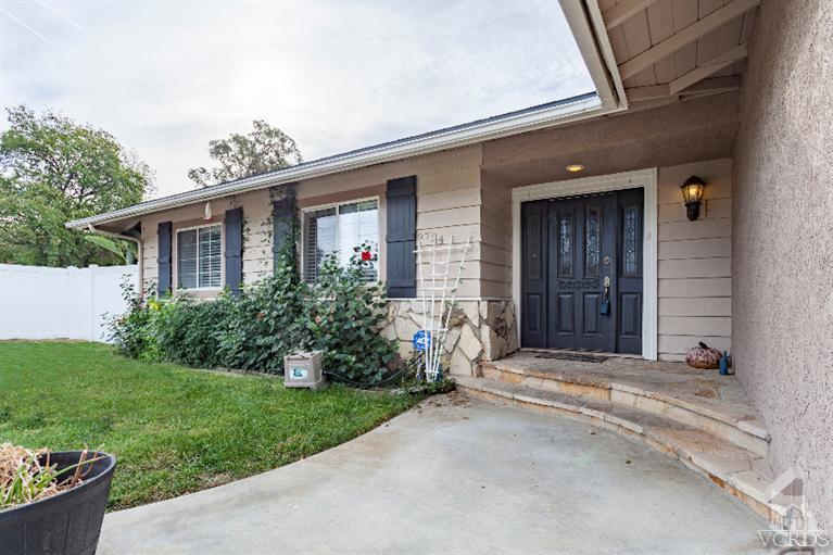 4724 Barnard Street Simi Valley, CA 93063 - Photo 2 of 30 a front view of a house with a yard