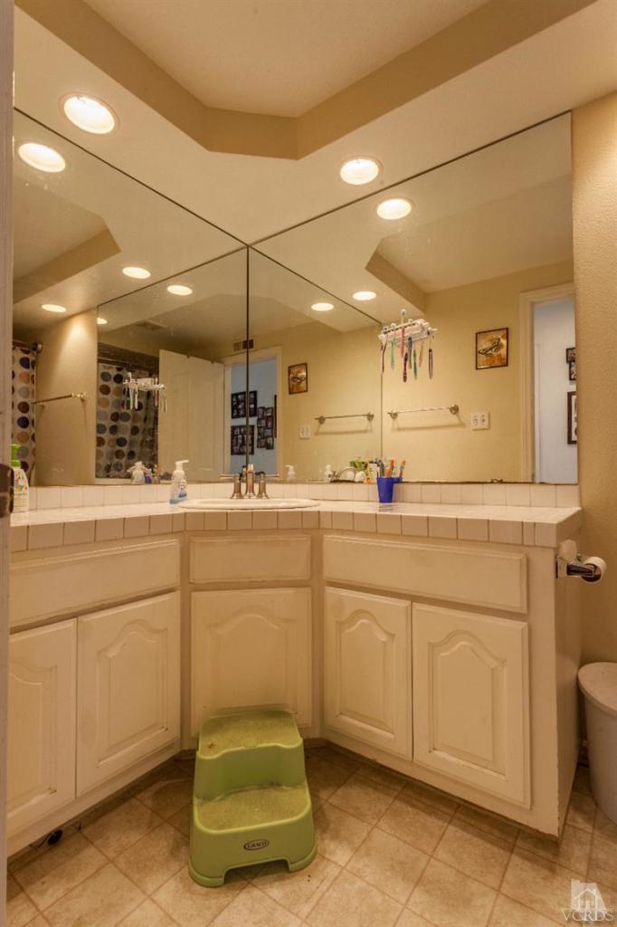 4724 Barnard Street Simi Valley, CA 93063 - Photo 13 of 30 a kitchen with sink and cabinets