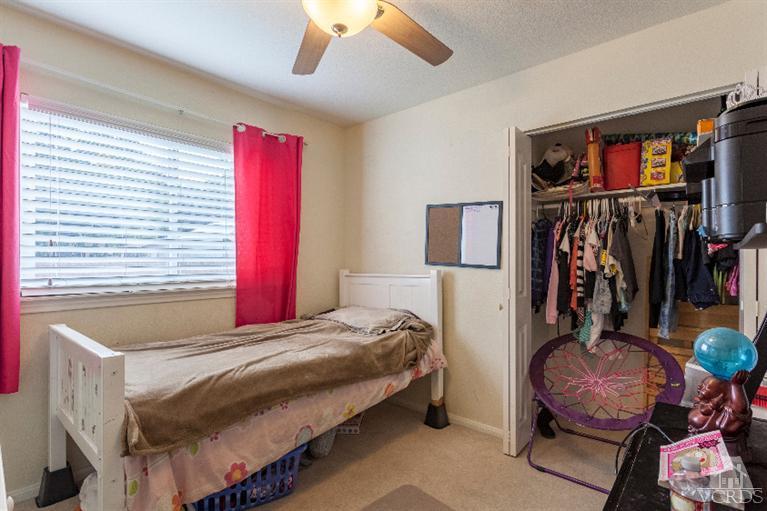 4724 Barnard Street Simi Valley, CA 93063 - Photo 16 of 30 a bedroom with a bed and a window