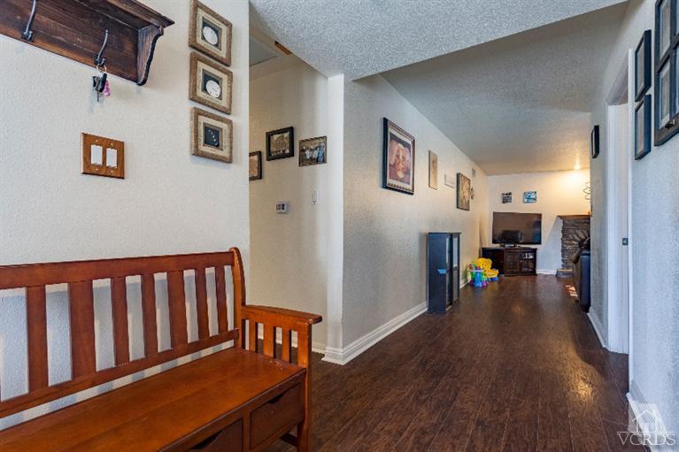 4724 Barnard Street Simi Valley, CA 93063 - Photo 3 of 30 a view of a livingroom with furniture and hardwood floor