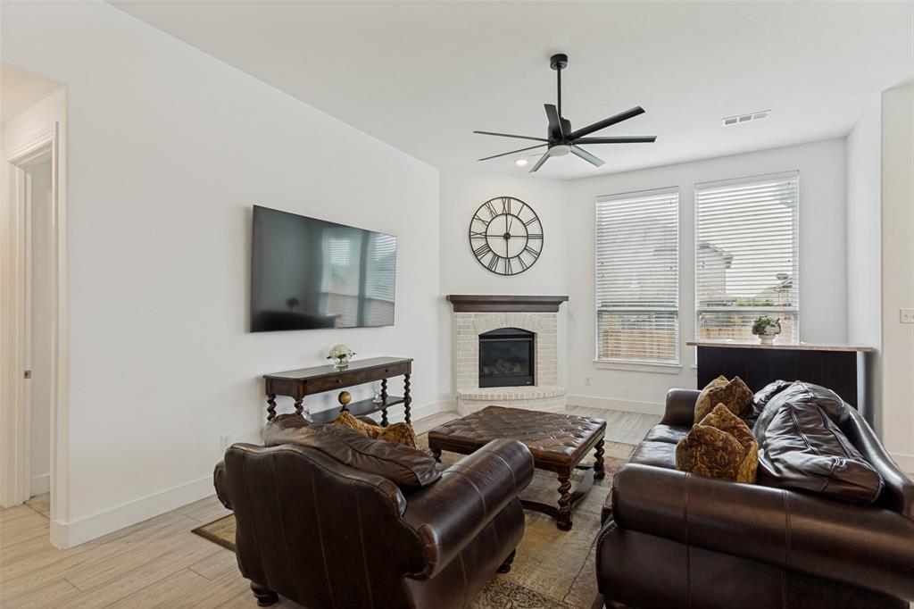 14937 Nightmist Road Aledo, TX 76008 - Photo 7 of 25 LIving area features a corner fireplace