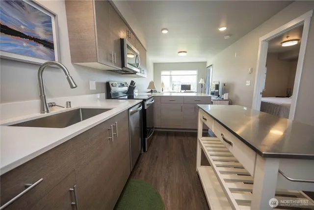 a kitchen with granite countertop lots of counter top space