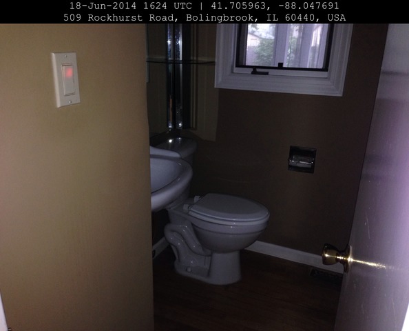 509 Rockhurst Road Bolingbrook, IL 60440 - Photo 7 of 14 a bathroom with a toilet and a sink