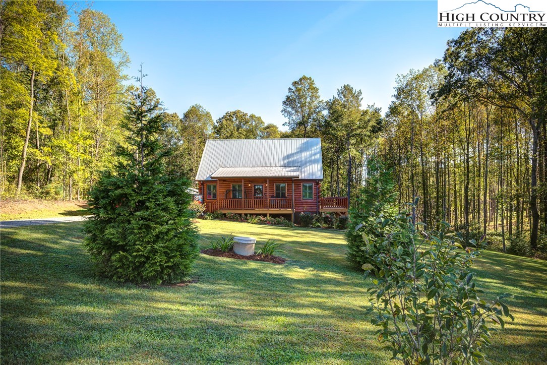 3460 South Center Church Road Thurmond, NC 28683 - Photo 4 of 50 a view of a house with a big yard
