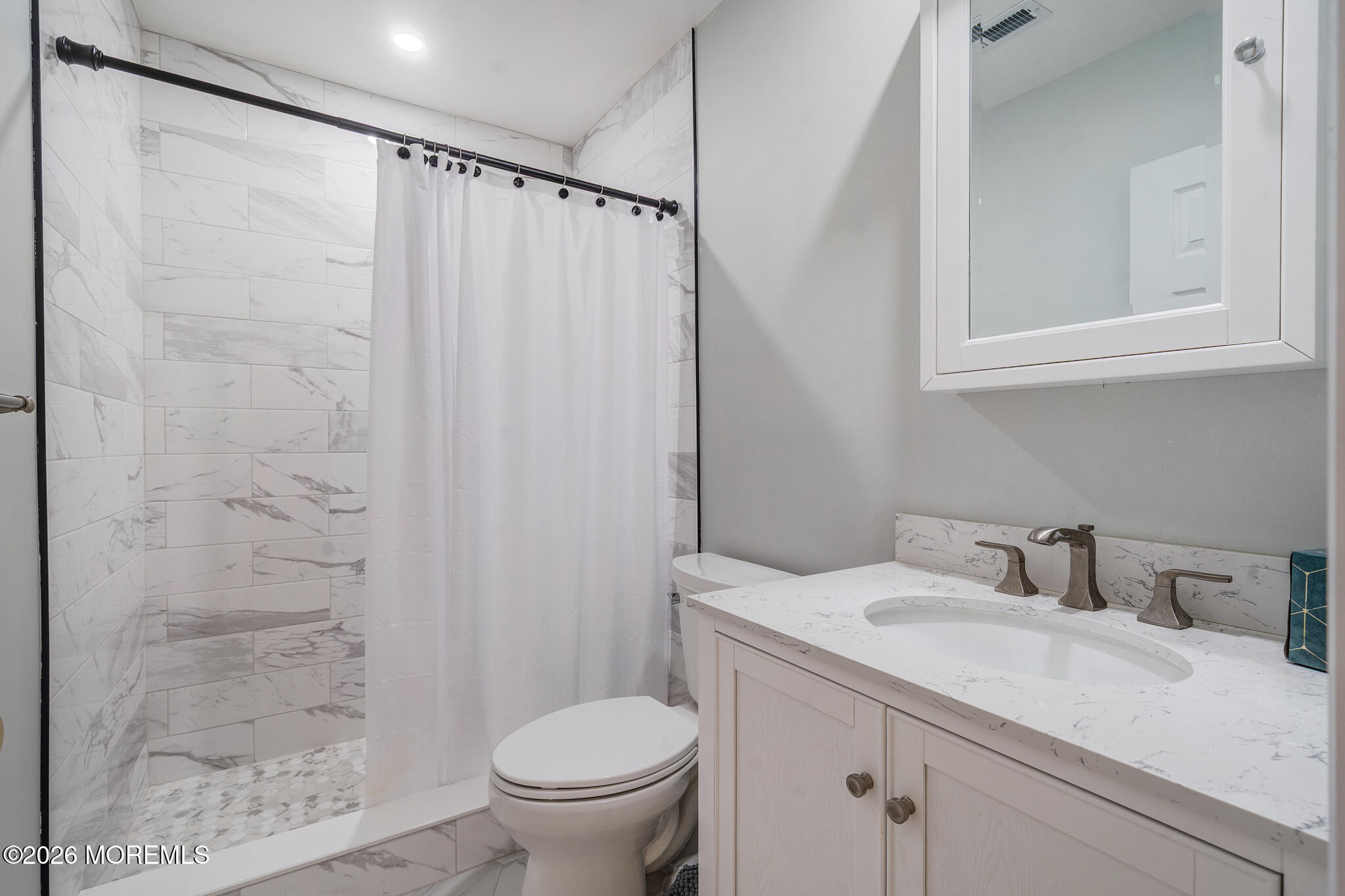 56 Privet Place Red Bank, NJ 07701 - Photo 15 of 19 a bathroom with a granite countertop sink toilet and shower