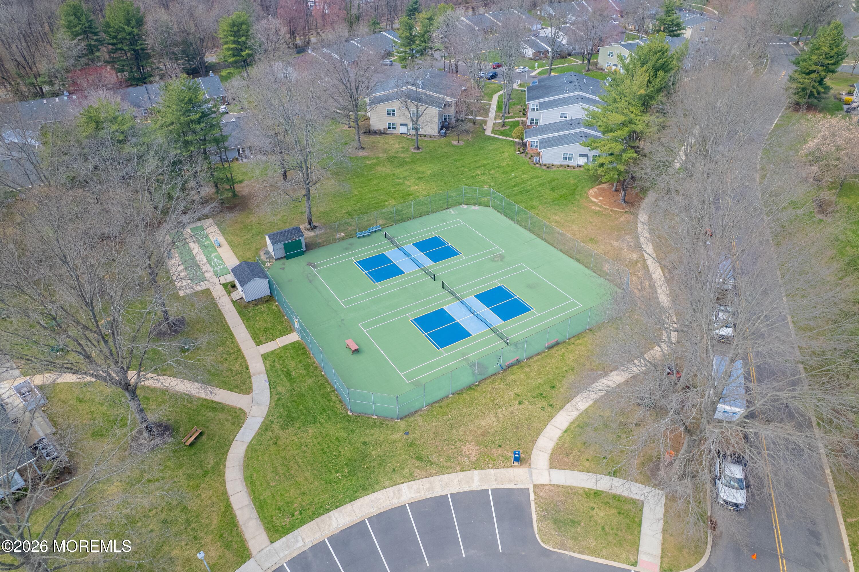 56 Privet Place Red Bank, NJ 07701 - Photo 17 of 19 a view of a swimming pool with a yard