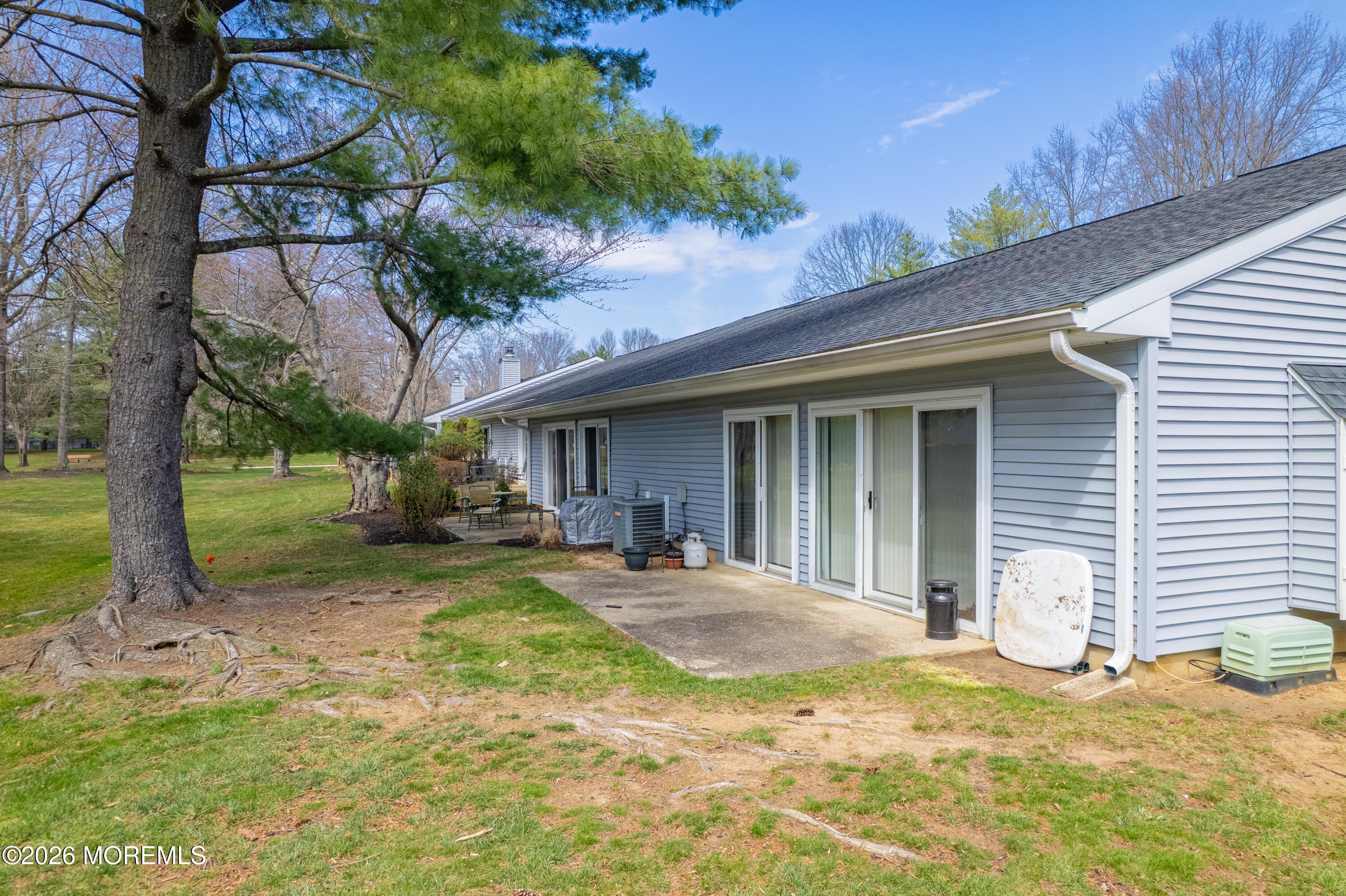 56 Privet Place Red Bank, NJ 07701 - Photo 3 of 19 a view of a house with backyard porch and sitting area