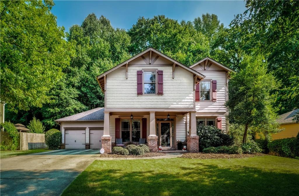 2689 Oak Village Trail Decatur, GA 30032 - Photo 1 of 1 a front view of a house with a yard and porch