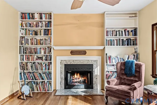 a kitchen with stainless steel appliances granite countertop a sink and a refrigerator
