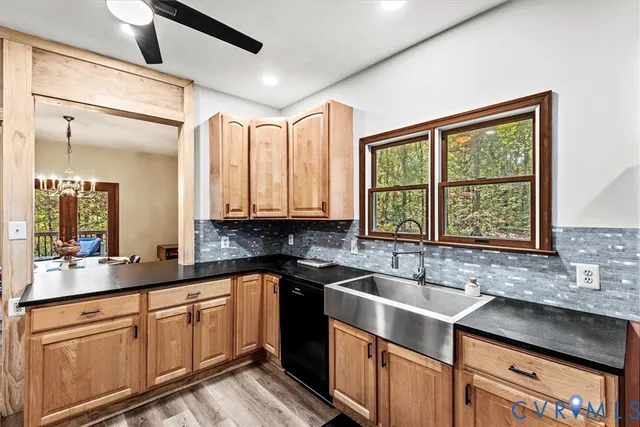 a spacious bedroom with a bed and a large window