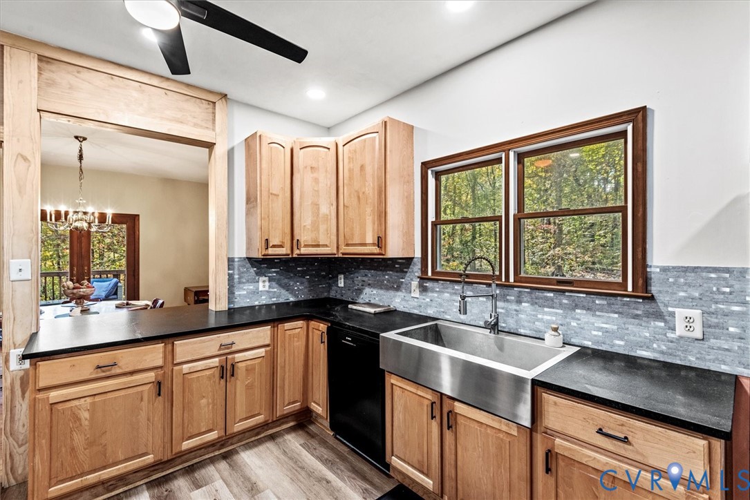 7358 Peppermill Road King George, VA 22485 - Photo 15 of 49 a kitchen with a sink window and cabinets