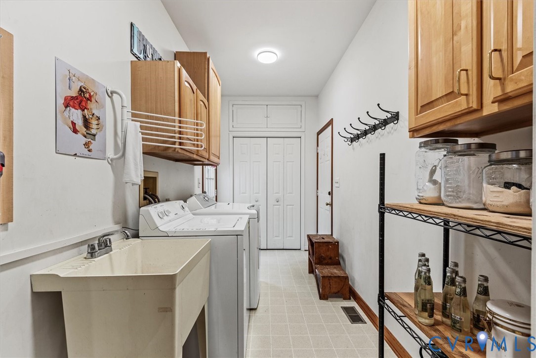 7358 Peppermill Road King George, VA 22485 - Photo 20 of 49 a bathroom with a sink a mirror and a shower