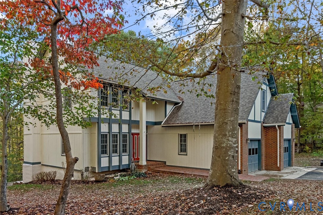 7358 Peppermill Road King George, VA 22485 - Photo 3 of 49 a view of a house with a tree