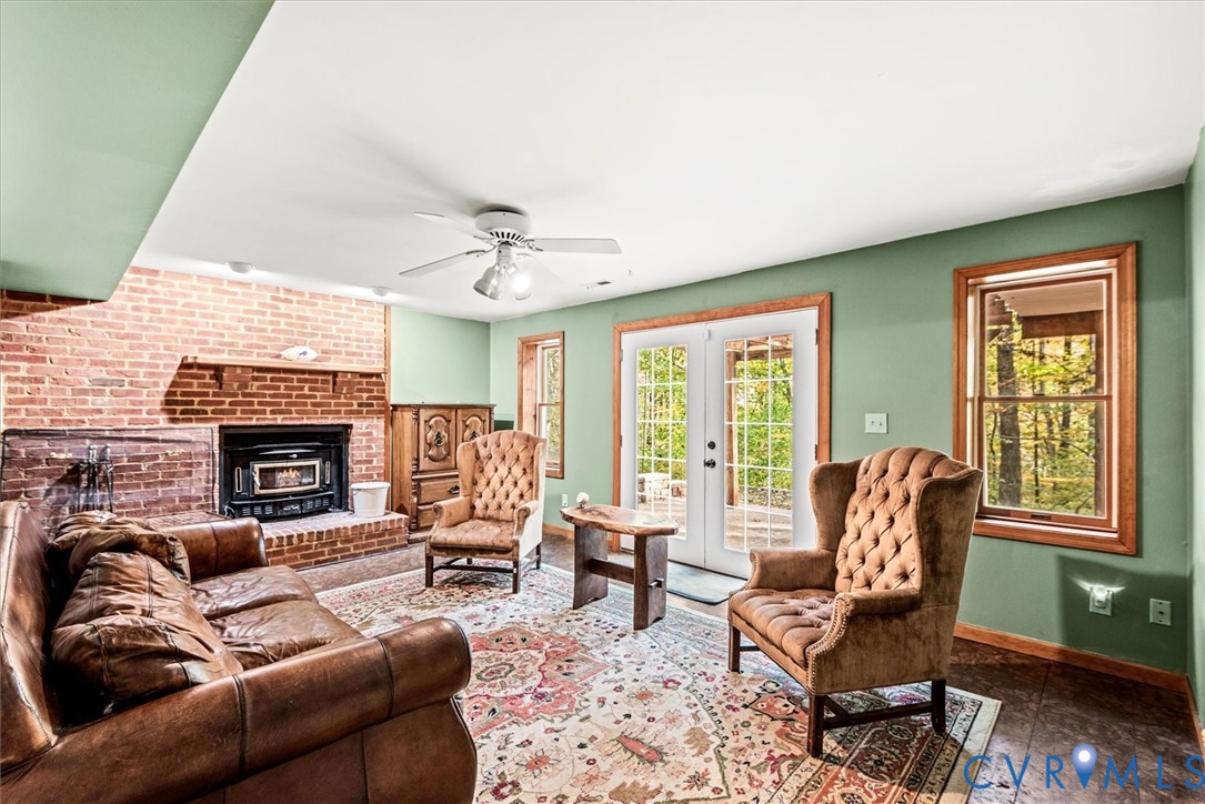 7358 Peppermill Road King George, VA 22485 - Photo 34 of 49 a living room with furniture and a fireplace