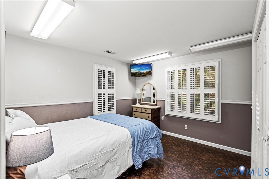 7358 Peppermill Road King George, VA 22485 - Photo 37 of 49 a bedroom with a bed and wooden floor