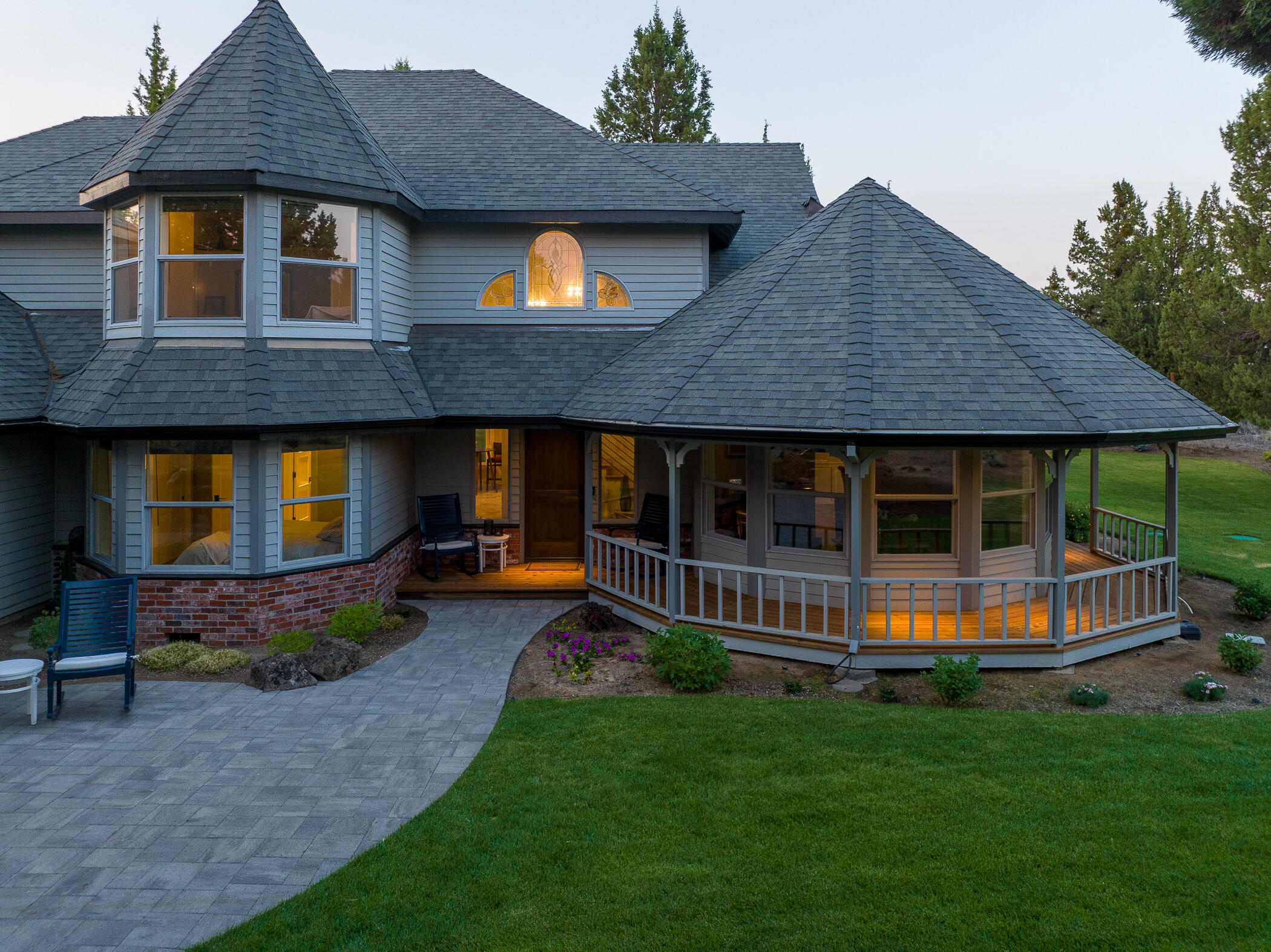 64300 Crosswinds Road Bend, OR 97703 - Photo 51 of 61 Windows to the left of the front door are to the guest room. The windows to the right are to the office/den.