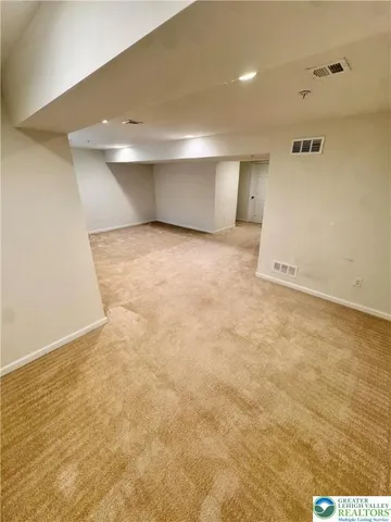 an empty room with a natural light