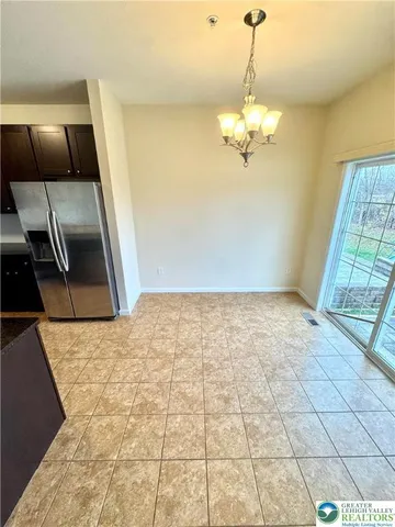 a view of a livingroom with a furniture