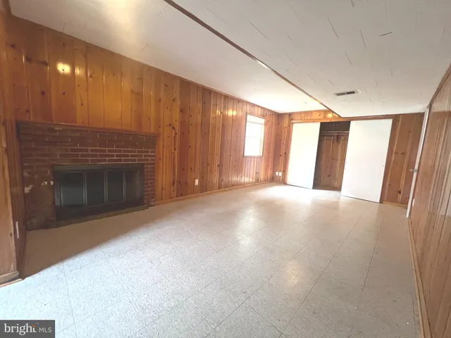 a view of a livingroom with a fireplace