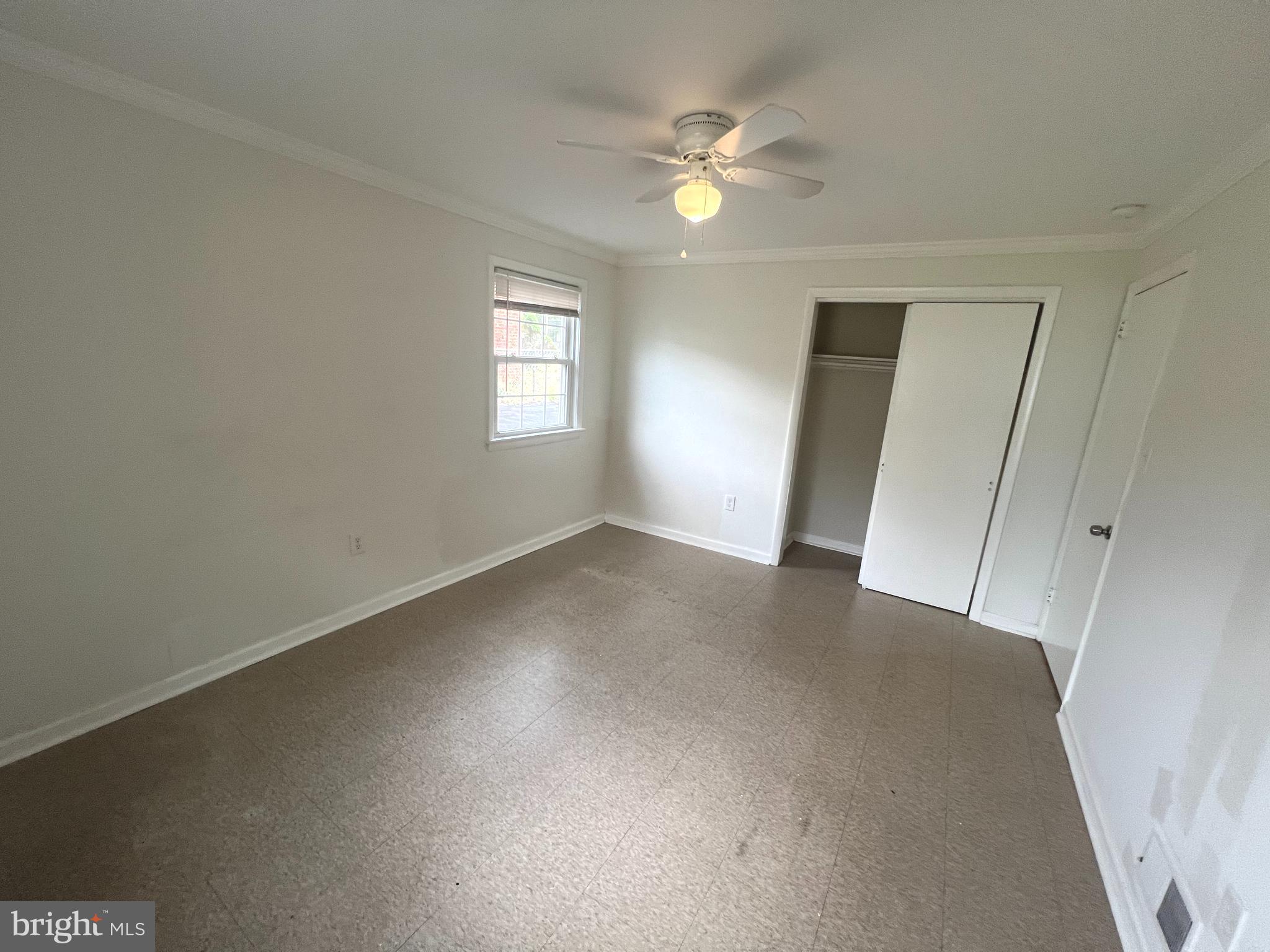 4517 North Carlin Springs Road Arlington, VA 22203 - Photo 14 of 21 an empty room with windows and fan