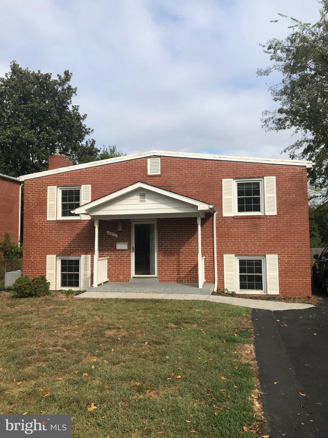 4517 North Carlin Springs Road Arlington, VA 22203 - Photo 2 of 21 a front view of a house with glass windows