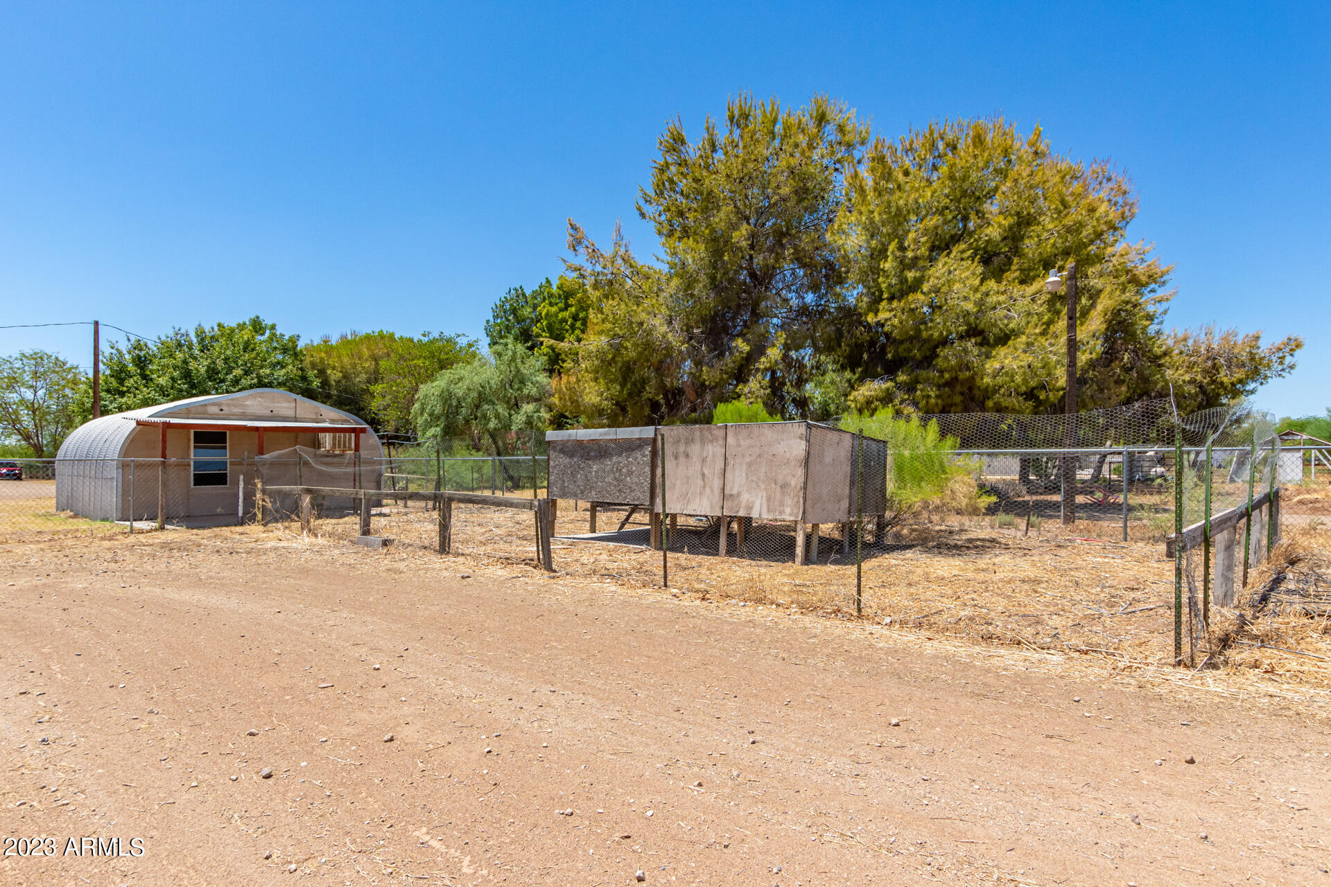 4958 East Rolling Ridge Road San Tan Valley, AZ 85140 - Photo 27 of 41 Fenced are for chickens, perhaps