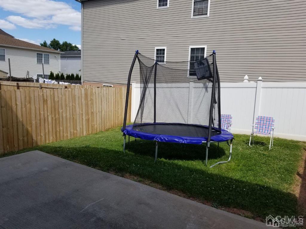 58 Christopher Street Carteret, NJ 07008 - Photo 20 of 20 a view of backyard with swimming pool