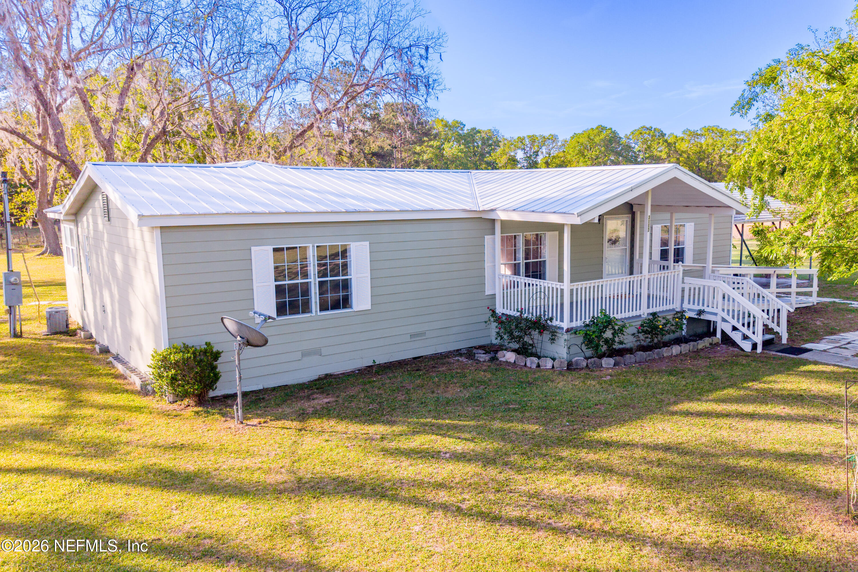 a view of a house with a swimming pool