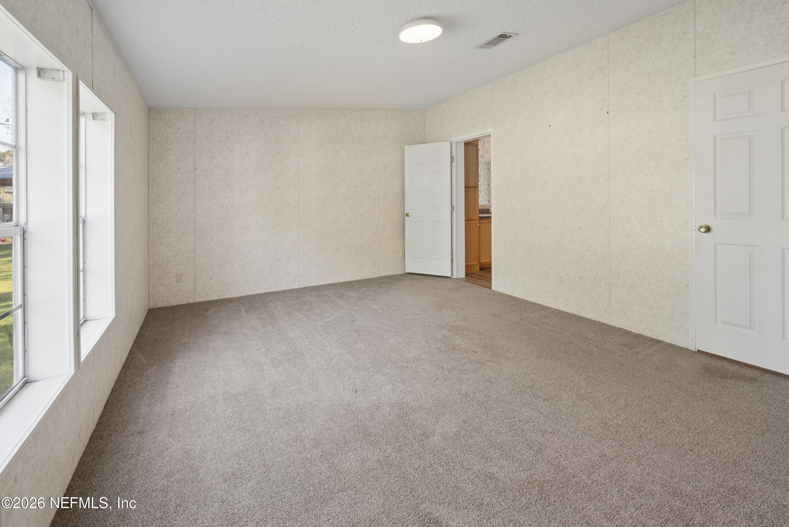 3112 Southeast 120th Street Starke, FL 32091 - Photo 11 of 30 a view of an empty room with a window