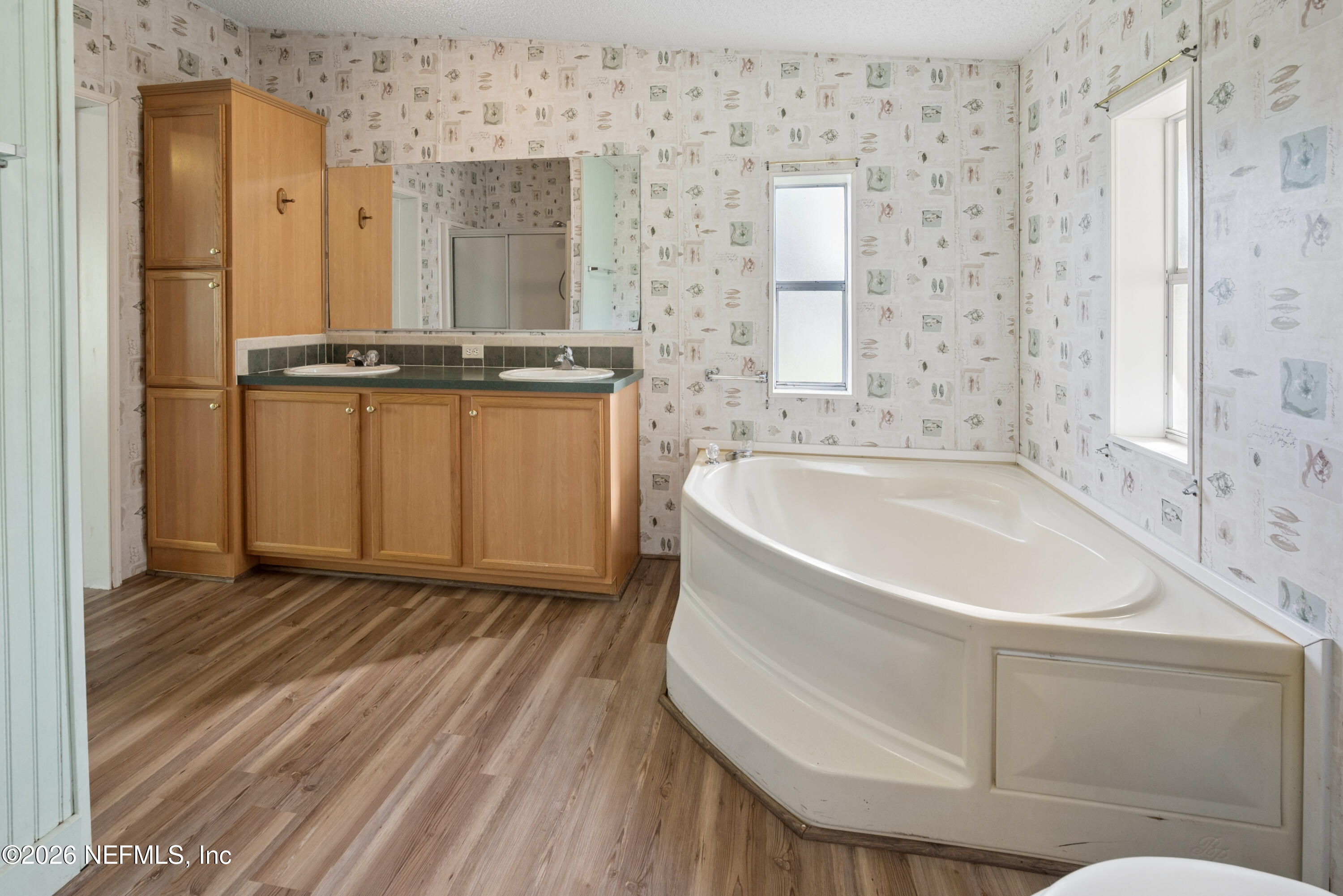 3112 Southeast 120th Street Starke, FL 32091 - Photo 14 of 30 a bathroom with a bathtub and shower