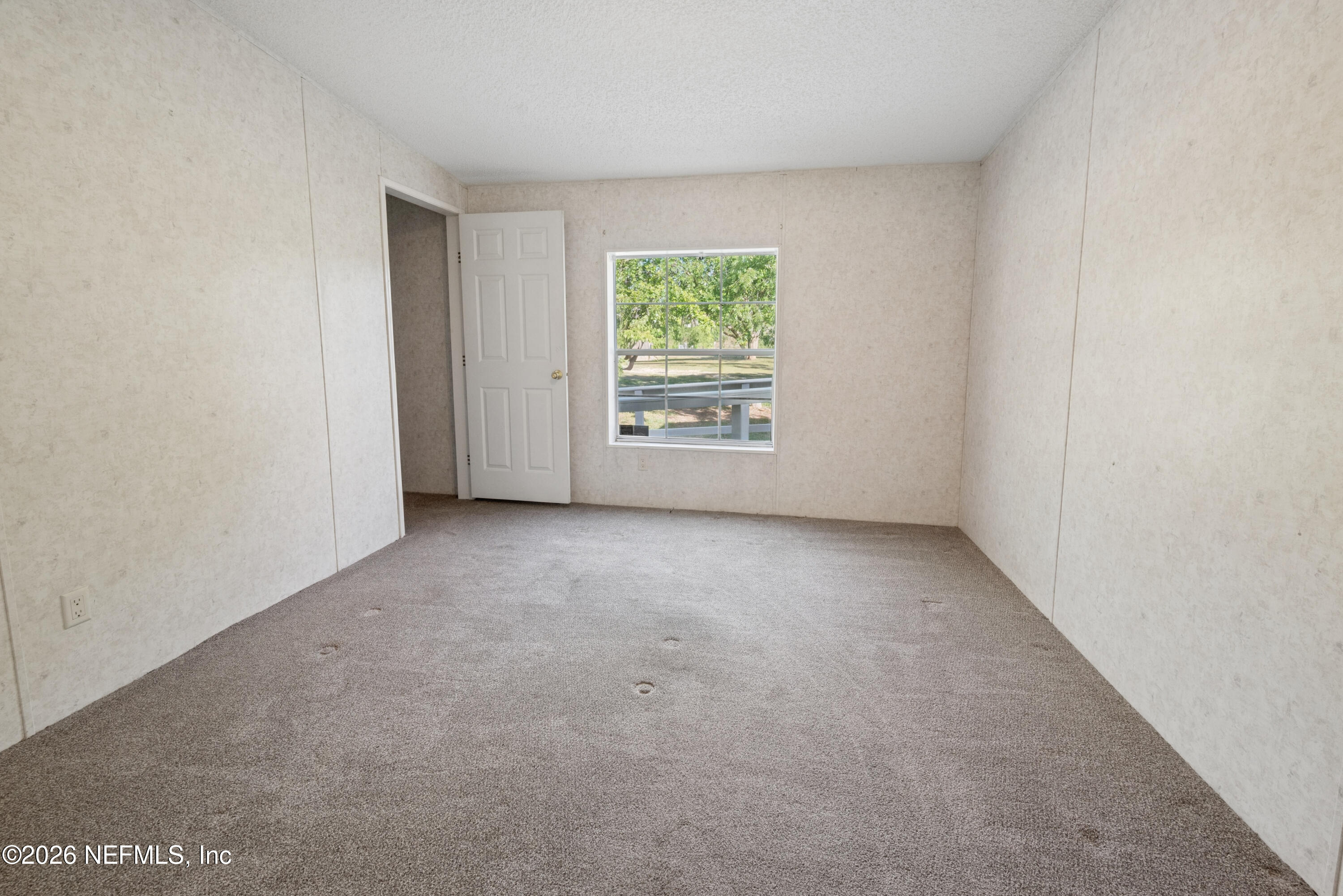 3112 Southeast 120th Street Starke, FL 32091 - Photo 19 of 30 a view of an empty room with a window