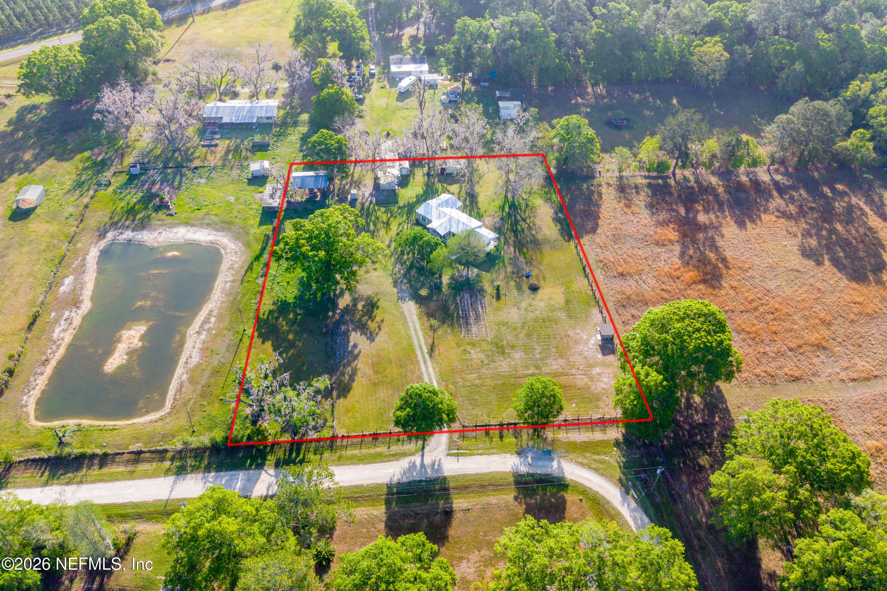 3112 Southeast 120th Street Starke, FL 32091 - Photo 3 of 30 an aerial view of houses with yard
