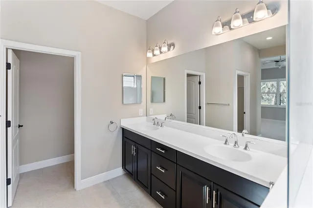 an aerial view of residential house with outdoor space and lake view