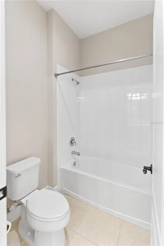 a view of a chair and table in the patio