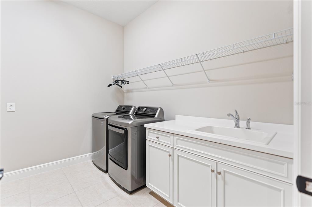 13017 Steinhatchee Loop Venice, FL 34293 - Photo 40 of 98 a utility room with dryer and washer
