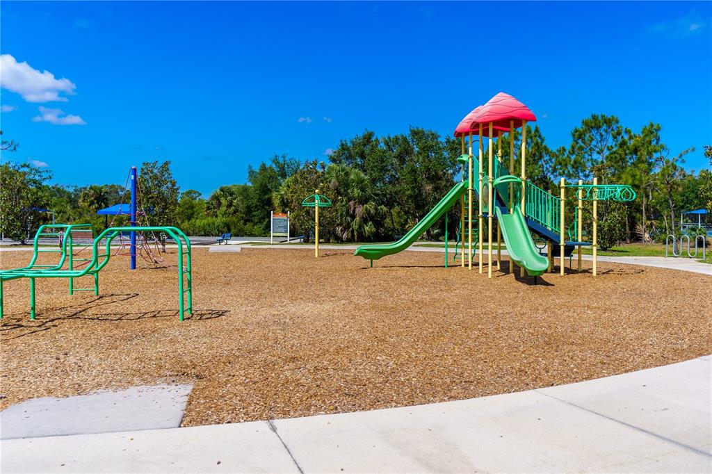13017 Steinhatchee Loop Venice, FL 34293 - Photo 61 of 98 a view of a park with swings