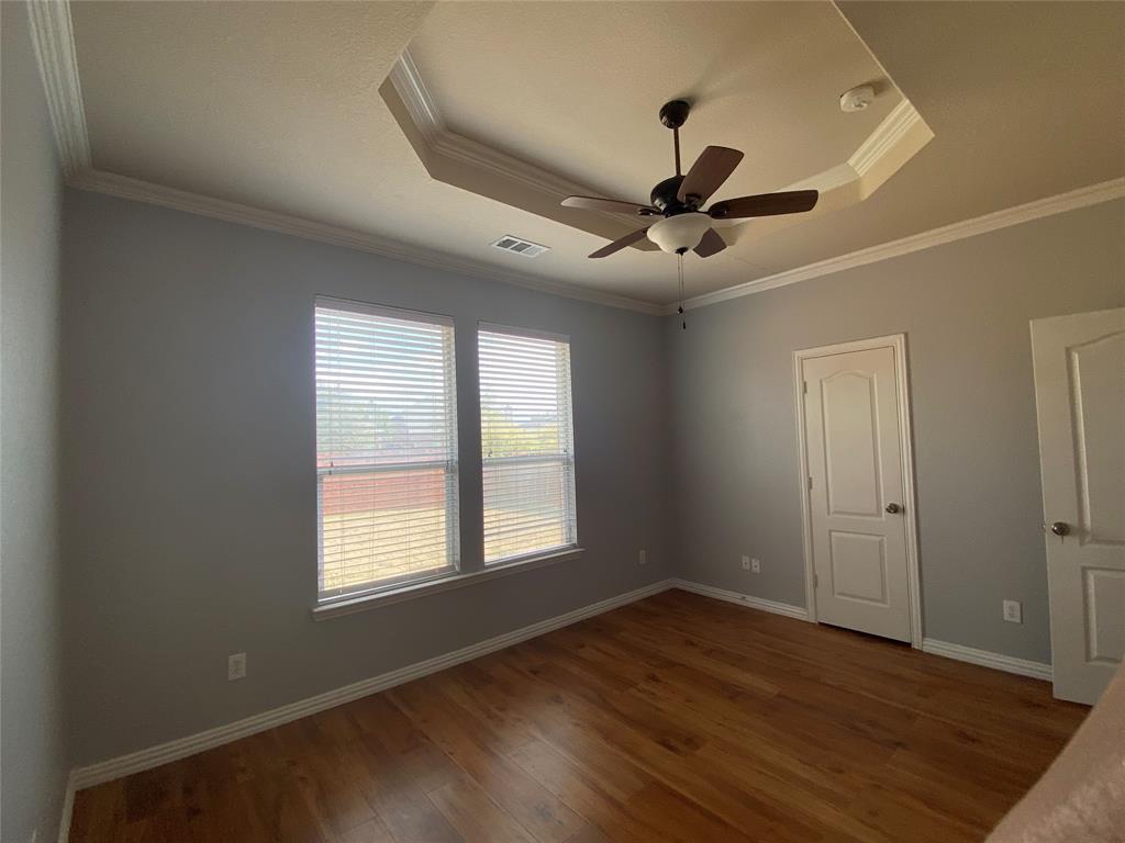 1708 Adams Place Prosper, TX 75078 - Photo 9 of 13 a view of an empty room with a window