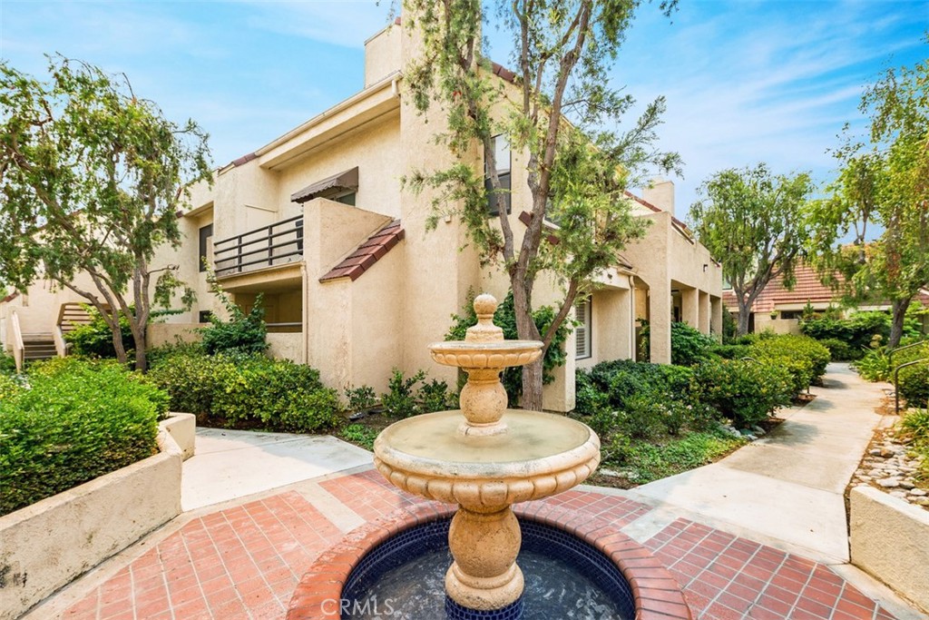 85 Pearl Laguna Niguel, CA 92677 - Photo 30 of 35 a view of a patio with table and chairs and potted plants
