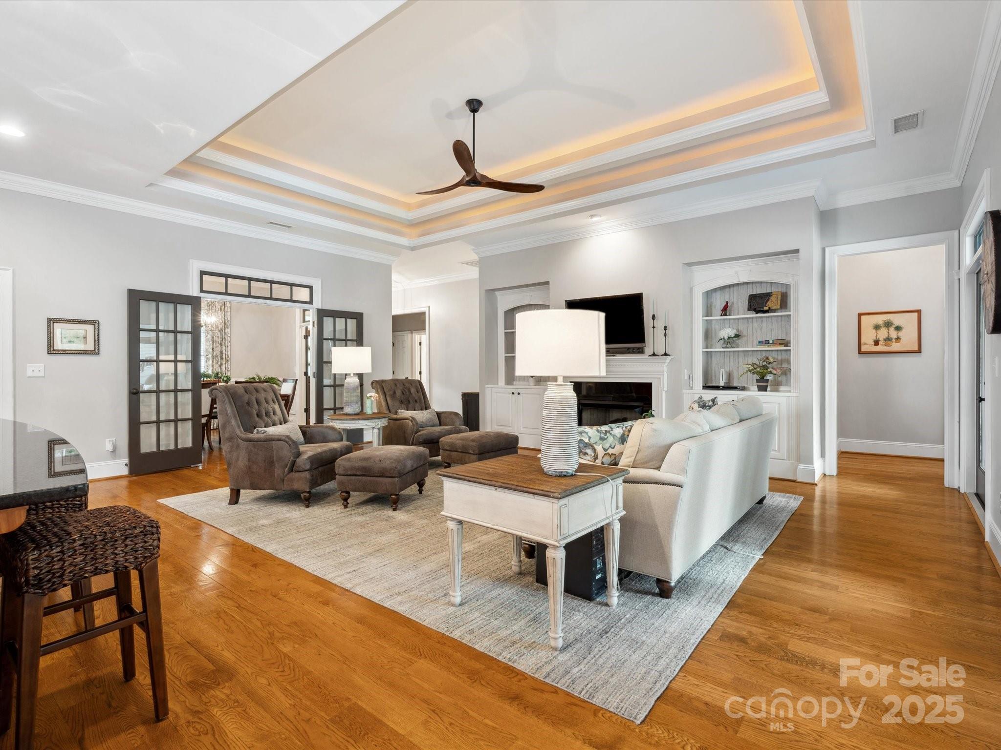 894 Stratford Run Drive Fort Mill, SC 29708 - Photo 12 of 45 a living room with furniture and a fireplace