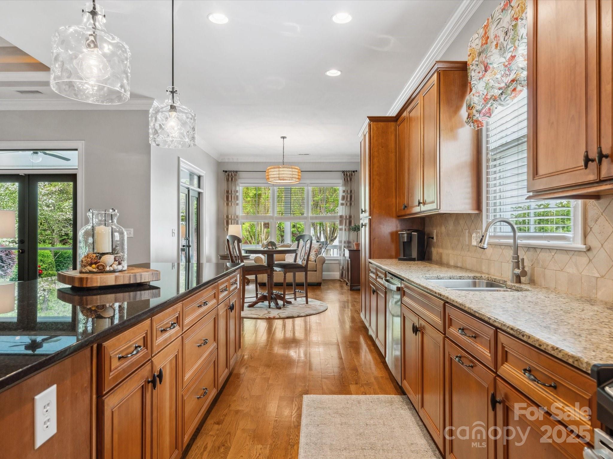894 Stratford Run Drive Fort Mill, SC 29708 - Photo 16 of 45 a kitchen with stainless steel appliances granite countertop a sink stove and cabinets
