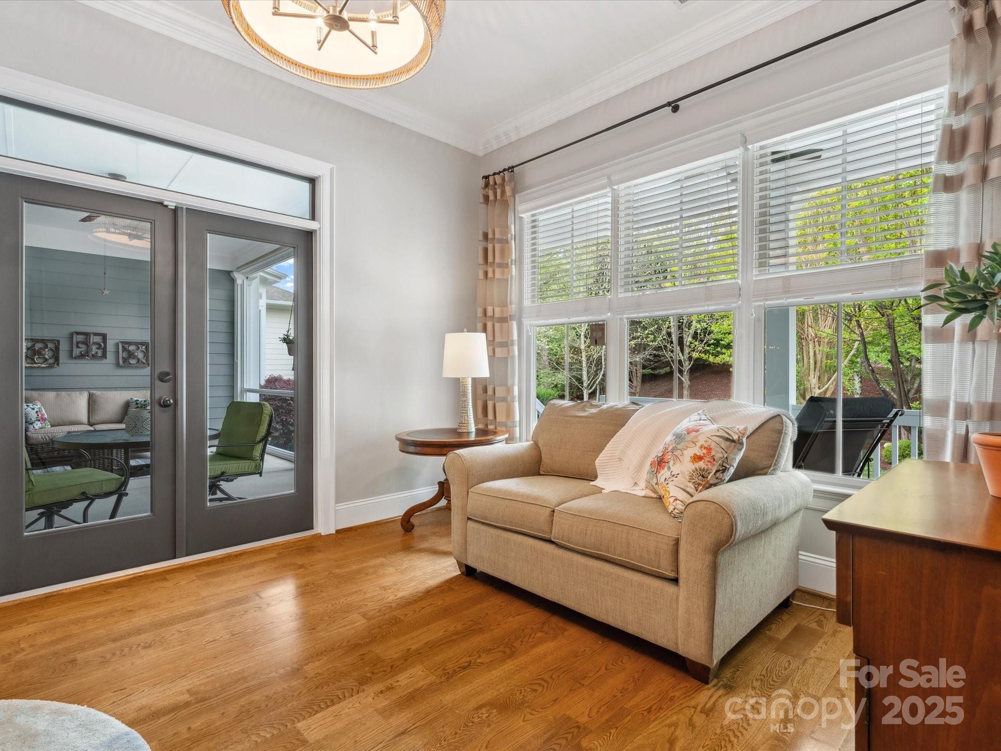 894 Stratford Run Drive Fort Mill, SC 29708 - Photo 19 of 45 a living room with furniture and a large window