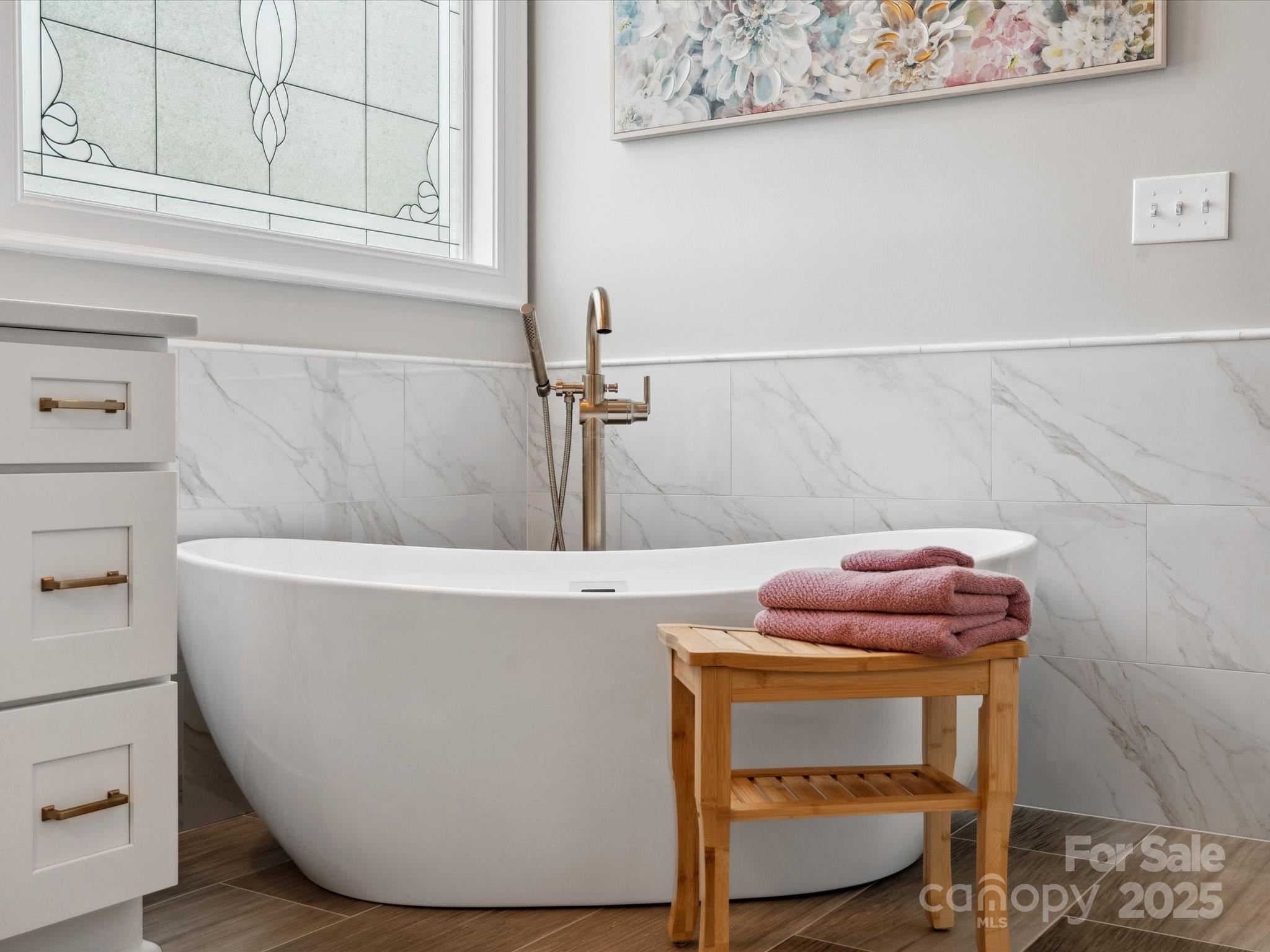 894 Stratford Run Drive Fort Mill, SC 29708 - Photo 26 of 45 a bath tub sitting next to a bathroom sink