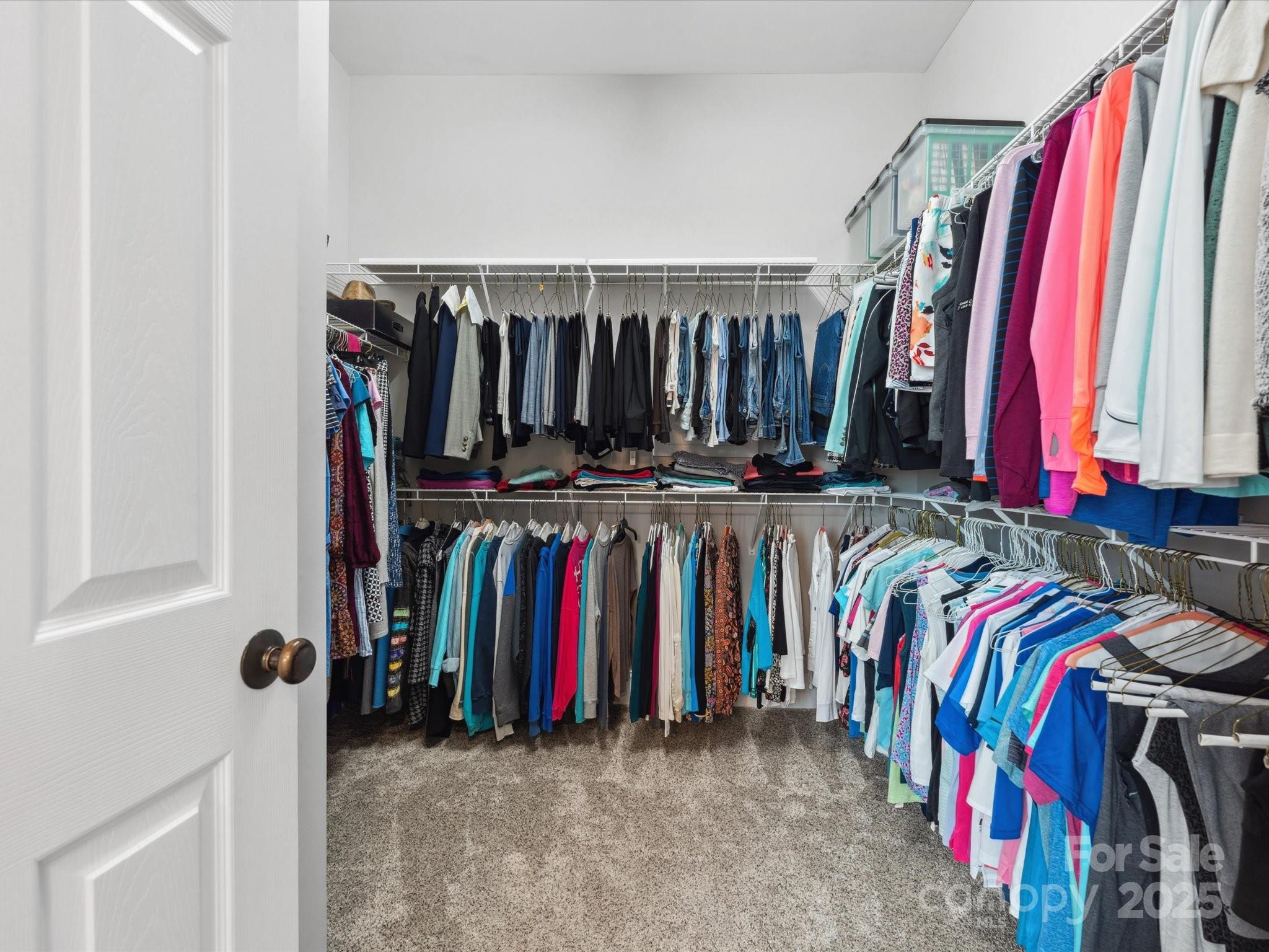 894 Stratford Run Drive Fort Mill, SC 29708 - Photo 27 of 45 a view of walk in closet with clothes