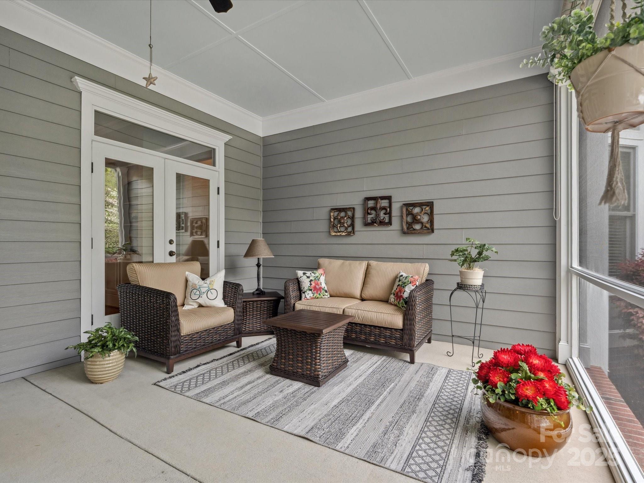 894 Stratford Run Drive Fort Mill, SC 29708 - Photo 29 of 45 a living room with furniture and flowers