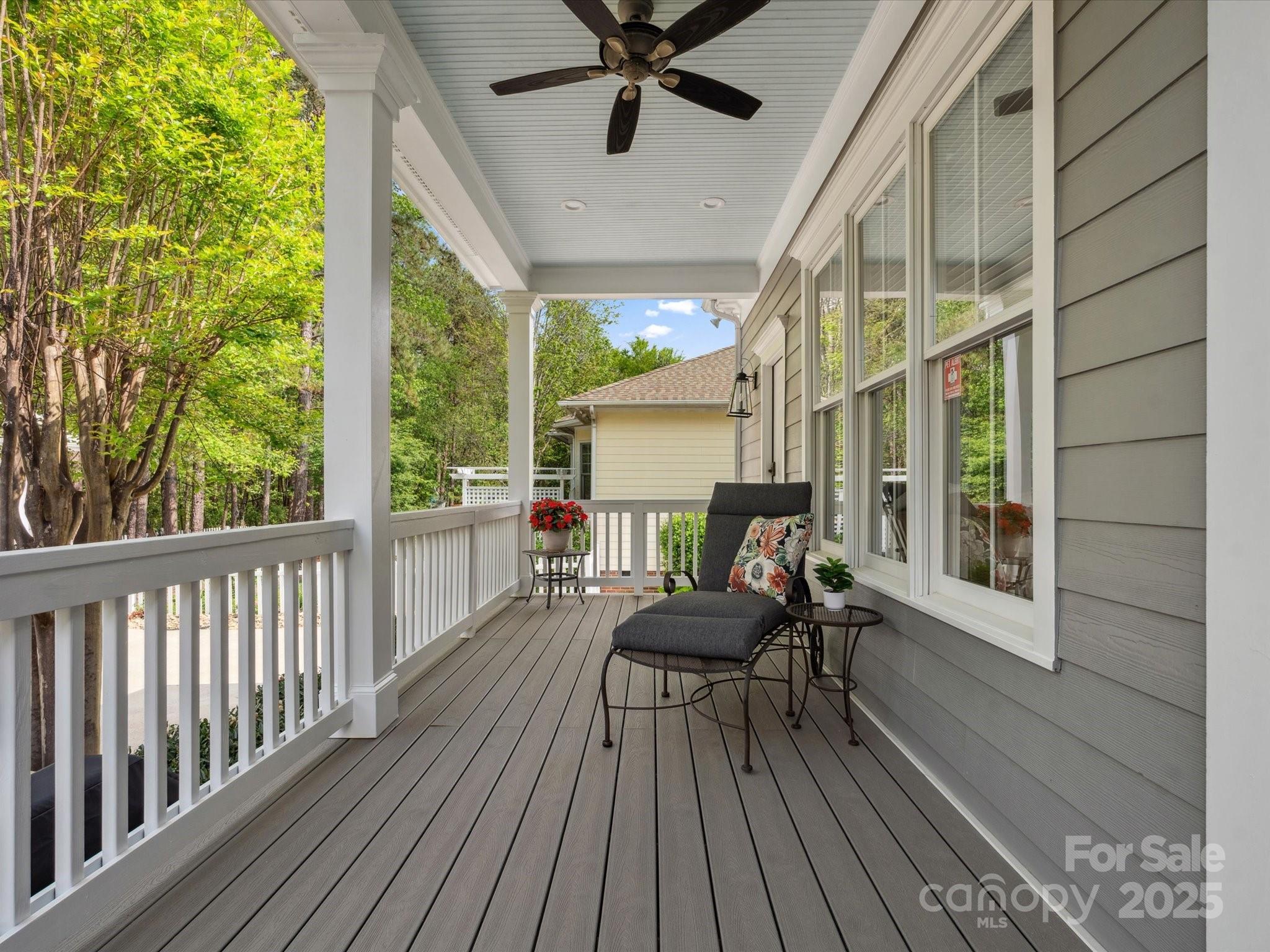 894 Stratford Run Drive Fort Mill, SC 29708 - Photo 32 of 45 a balcony with chairs and wooden floor